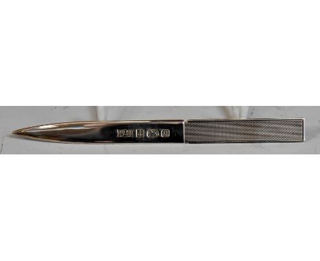 An Elizabeth II silver letter opener, engine turned handle, William H Manton, Birmingham, 1990, 0.82 ozt (25.4 grams)CONDITIO