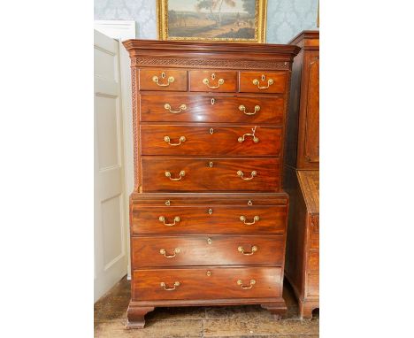 A George III mahogany chest on chest, decorated&nbsp;with blind fretwork throughout, the upper section with&nbsp;three short 