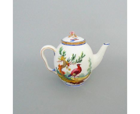 A small Sèvres tea pot and cover, painted each side with birds in a landscape, with the blue line and gilt dash border to rim