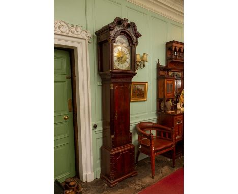 A George III mahogany eight day longcase clock, by Thomas Ashton, Macclesfield, with a swan neck pediment and single door enc