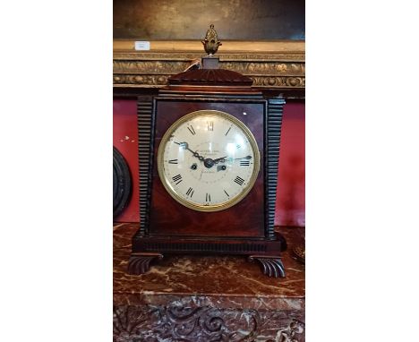 A mid 19thC mahogany cased 8 day bracket clock. White enamel dial with black Roman numerals.&nbsp;