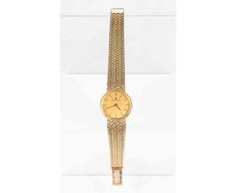 Jaeger Le Coultre, a lady's 18ct gold Jaeger Le Coultre wristwatch, 2cm circular dial with baton hands and numerals, backplat