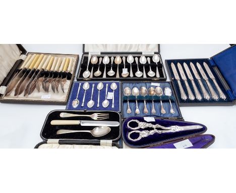 A collection of silver flatware including: a set of six enamelled silver coffee spoons, by Barker Brothers Silver Ltd, assaye