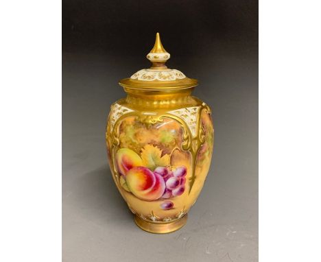 A Royal Worcester vase and cover, painted with fruit, No.169, signed T. Nutt, 20th Century black mark Made in England, 17cm h