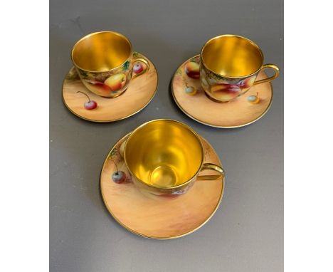 Three Royal Worcester miniature cups and saucers painted with fruit, signed Roberts, 20th Century, England, cups 5cm high, 5.