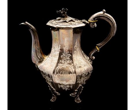 A Victorian silver coffee pot, facetted body engraved with flowers and foliage, the body engraved with inscription, the hinge