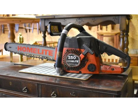 A Homelite 250 18 inch petrol chainsaw