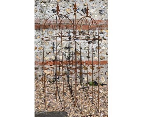 A trio of weathered steel arrow head garden obelisks,122 cm x 38 cm