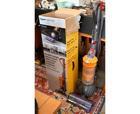 A Dyson light ball multi-floor vacuum cleaner with box (used and untested)