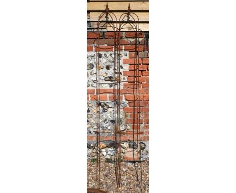 A pair of weathered steel arrow head garden obelisks,&nbsp;197 cm x 28 cm