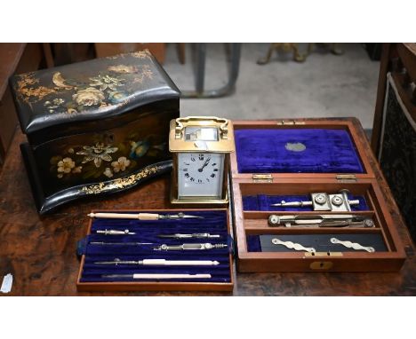 A Victorian floral-painted papier mache tea caddy, 22 cm wide to/w a set of drawing instruments in fitted teak case and a Fre