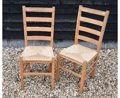 A set of six beech/light oak ladderback dining chairs with woven rope seats (6)