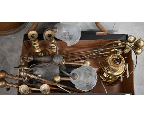 Two pairs of Victorian brass baluster candlesticks, to/w a pair of fire-dogs, two sets of brass fire-irons, brass oil lamp ba