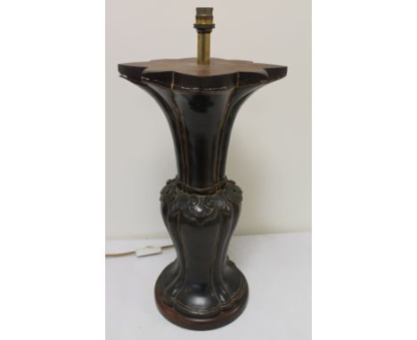 Bronzed table lamp in the form of an archaic Oriental vase. 21" high.   Condition Report.  Re wiring required and electrical 