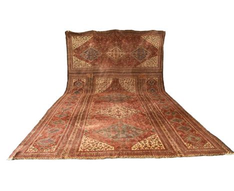 A large Khamseh 'chicken' carpetLate 19th / early 20th centuryWith multiple blue and beige geometric lozenges and spandrels o