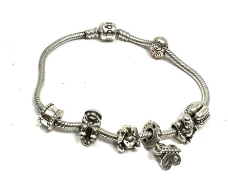 Pandora silver charm bracelet and charms weight 38g 