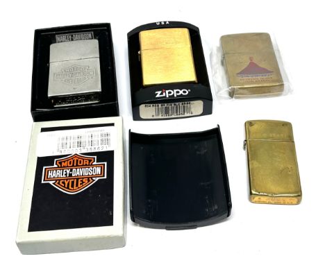 4 vintage zippo lighters 