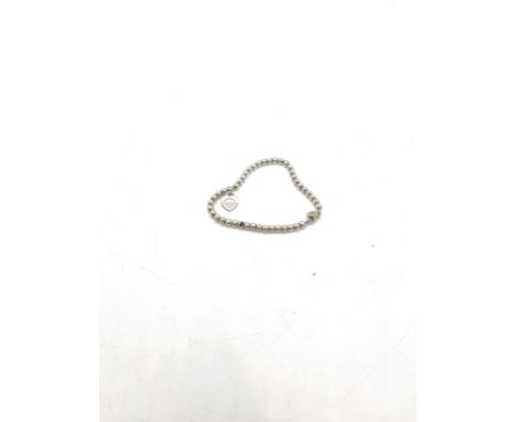 Silver beaded bracelet with heart charm by designer Tiffany &amp; Co (6g) 