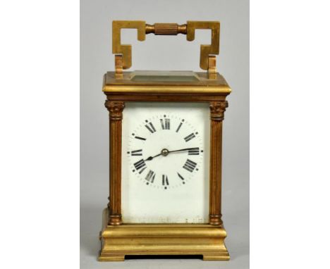 A late 19c French carriage clock with two train movement with silvered platform escapement and striking on a gong.  The recta