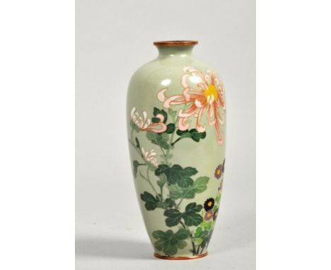 A Japanese Meiji period cloisonne baluster vase of copper base, enamel eggshell background decorated with various flowers and