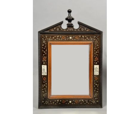 A 19c Italian black lacquered wall mirror with broken arch pediment, turned urn shaped pediment with gadrooned edges, the pan