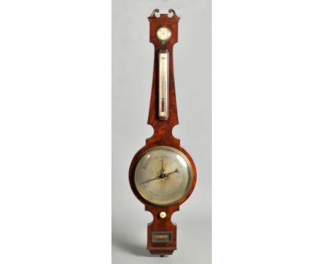 A mid 19c wheel barometer by Guildford & Kirby, Uxbridge giving the following indications top to bottom; hygrometer, alcohol 