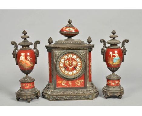 A late 19c French garniture de cheminee comprising a central clock flanked by two urns.  The cases of all three are construct