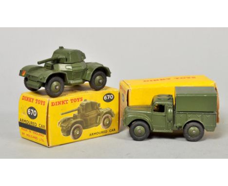 A Dinky Toys army one ton cargo truck, no.641, together with an armoured car, no.670, boxed.