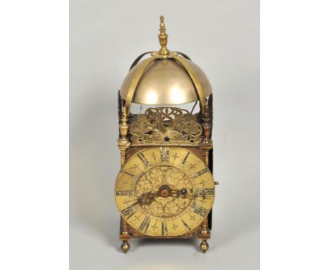 A late 19c lantern clock with single fusee movement, the chapter ring signed John Fordham, Dunmow, no.132. The lacquered bras