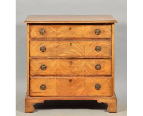 A George III mahogany chest of small proportion, being of rectangular form with moulded edge, having four long graduated draw