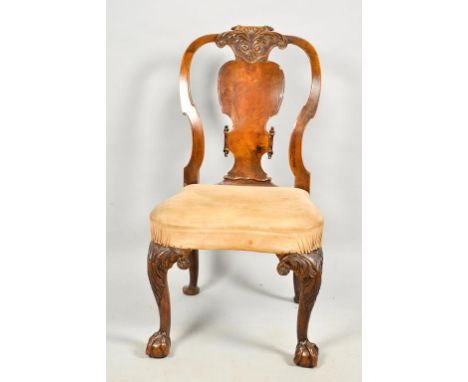 An 18c early Georgian style walnut single chair with an upholstered shaped seat, having a solid vase shaped back panel under 