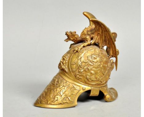 A Victorian brass helmet clock case, the helmet mask and mythical beast cast and with a griffin pediment, 7h.