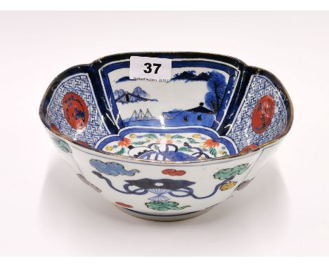 An unusual Chinese Imari style bowl, with central decoration of a sacred scroll, 19.5 x 8.5cm. Provenance: estate of a gentle