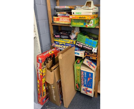 A large quantity of vintage toy and games.