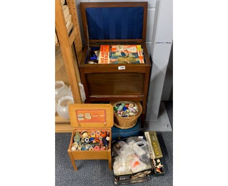 A vintage mahogany workbox and sewing related contents together with further boxes of buttons and other related items.