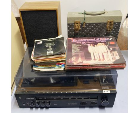 A vintage Philips turntable and radio receiver (one speaker) and a quantity of mixed records.