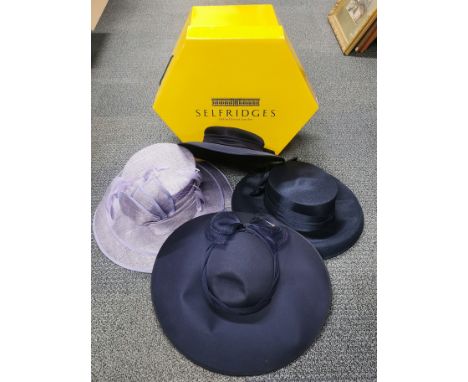 A group of vintage ladies hats.