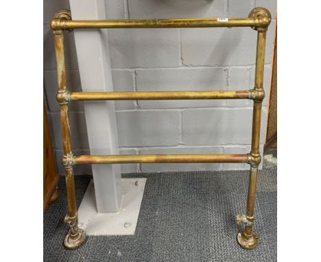An vintage brass bathroom heated towel rail, W. 84cm. H. 95cm.