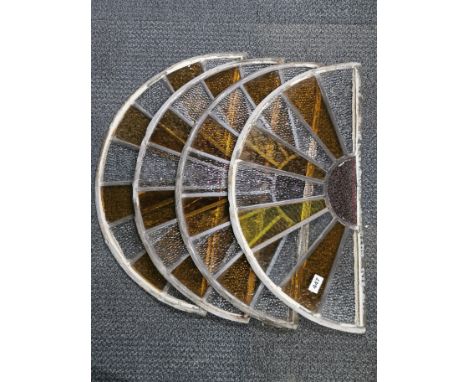 Four Art Deco fan shaped lead light windows, W. 64cm.
