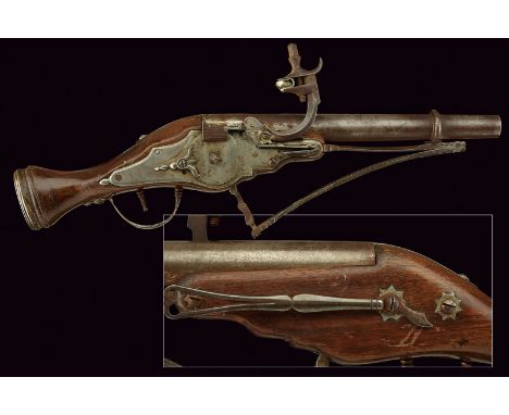 A wheel-lock pistol with external spring dating: 20th Century provenance: Europe Smooth, round, 15 mm cal. barrel, with a thi