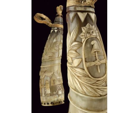 A powder-flask dating: 19th Century provenance: Argentina Ox horn body, richly chiselled with the coat of arms of Argentina, 