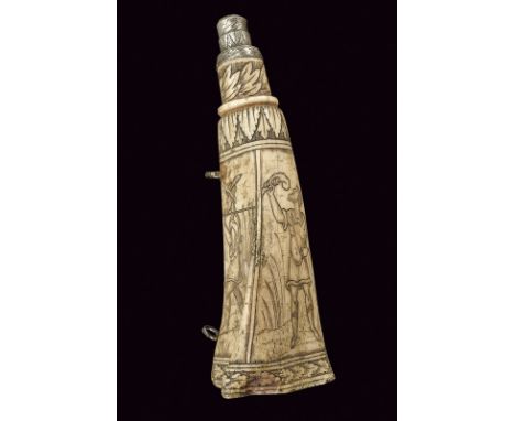 An interesting powder-flask dating: 17th Century provenance: Germany Bone body of triangular section, with hollow faces, engr