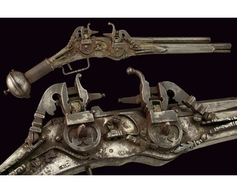 An over and under double-barrelled wheel-lock pistol dating: 20th Century provenance: Europe Smooth, two-stage, 11 mm cal. ba