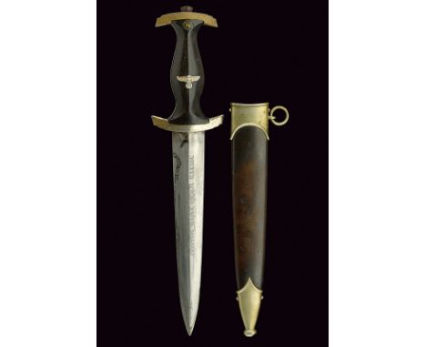 A SS dagger dating: second quarter of the 20th Century provenance: Germany Straight, double-edged blade, ribbed at the centre