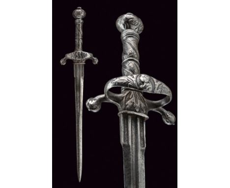 A left hand dagger dating: second quarter of the 17th Century provenance: Italy Straight, double-edged blade ribbed at the ce