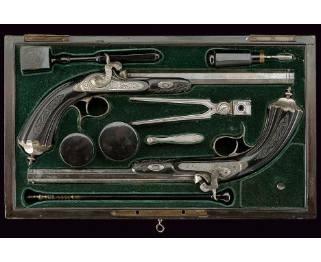 A cased fine pair of Devisme percussion pistols dating: mid-19th Century provenance: France Octagonal, rifled, 11 mm cal. bar