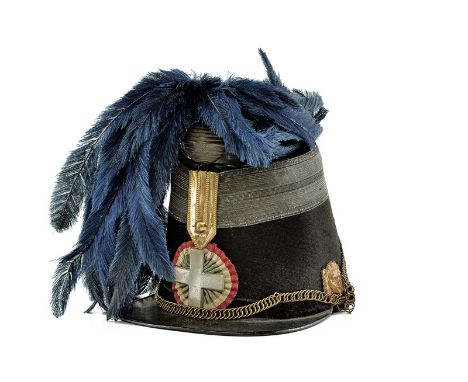 A National Guard shakot dating: third quarter of the 19th Century provenance: Kingdom of Italy Semi-rigid black felt body, wi