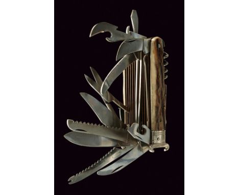 A pocket folding knife with various tools dating: mid-20th Century provenance: Central Europe Interesting knife with eighteen