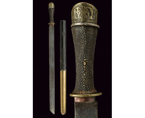 A sword (Jian) dating: 19th Century provenance: Tibet Typical, wide, single-edged blade; brass hilt, engraved, grip with fish