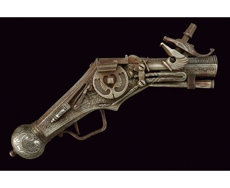 A short wheel-lock pistol with iron stock dating: 20th Century provenance: Europe Two-stage, iron barrel, octagonal and round